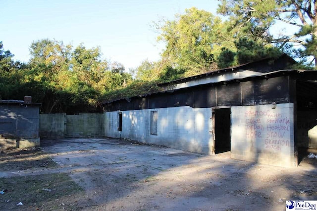 garage featuring fence