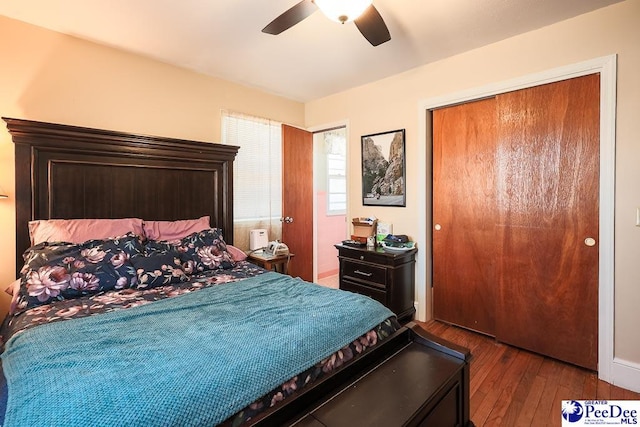 bedroom with a ceiling fan and hardwood / wood-style floors