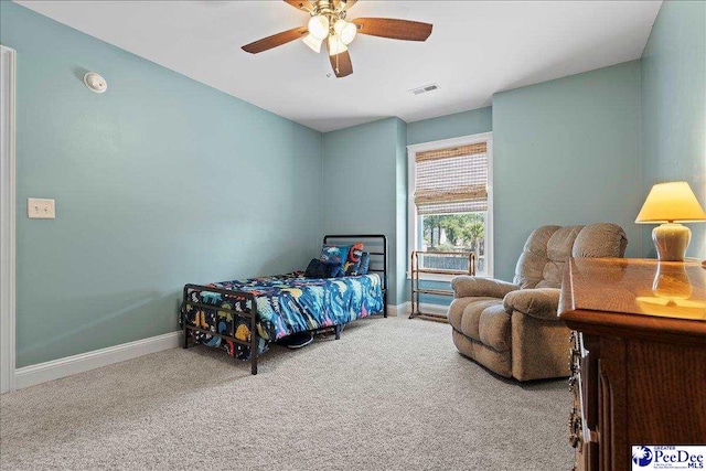 bedroom featuring carpet flooring, baseboards, visible vents, and ceiling fan