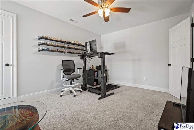 workout area with carpet flooring, baseboards, visible vents, and ceiling fan