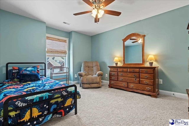 bedroom featuring carpet flooring, visible vents, and baseboards