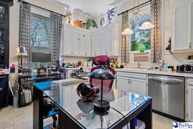 601 E Main St, Dillon, SC 29536 - kitchen with dishwasher, light tile patterned floors, white cabinets, crown molding, and light countertops