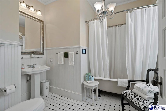 601 E Main St, Dillon, SC 29536 - bathroom with a wainscoted wall, crown molding, a chandelier, and shower / bathtub combination with curtain