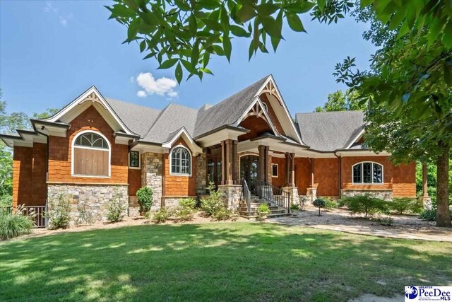 view of front of home with a front yard