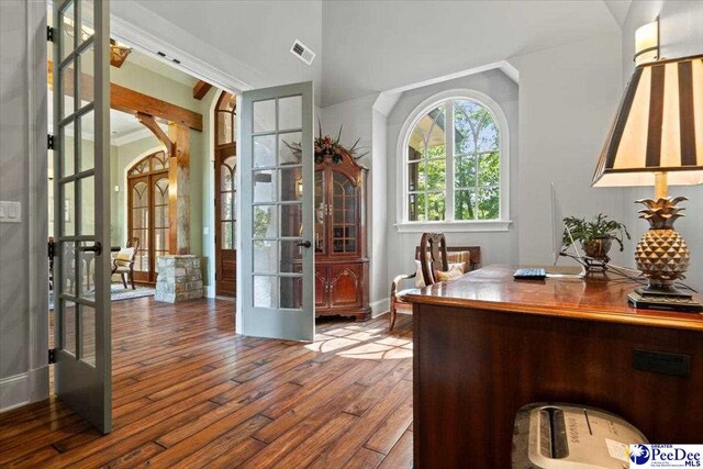 office featuring hardwood / wood-style floors, crown molding, and french doors