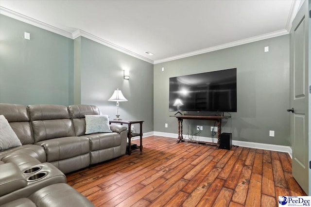 living room with ornamental molding and hardwood / wood-style floors