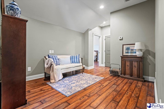 sitting room featuring wood-type flooring