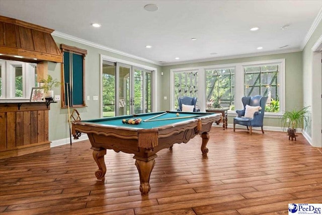 playroom featuring billiards, ornamental molding, and hardwood / wood-style floors