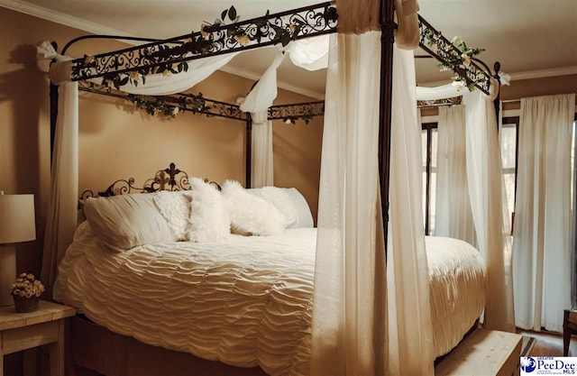 bedroom featuring crown molding