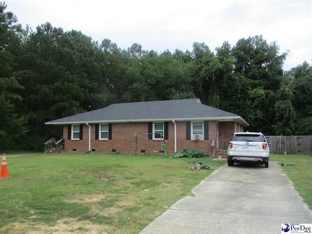 single story home featuring a front yard