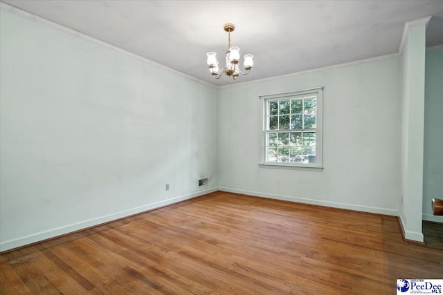1817 E Sandhurst Dr, Florence, SC 29505 - empty room with crown molding, light wood-style floors, a chandelier, and baseboards