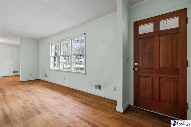 1817 E Sandhurst Dr, Florence, SC 29505 - entryway featuring light wood-style flooring, crown molding, and baseboards