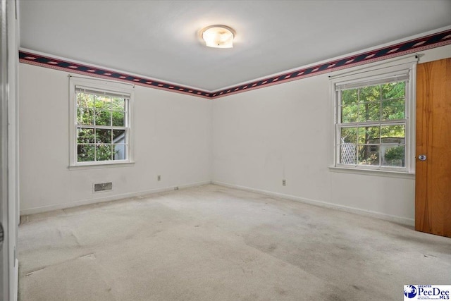 1817 E Sandhurst Dr, Florence, SC 29505 - carpeted empty room with baseboards