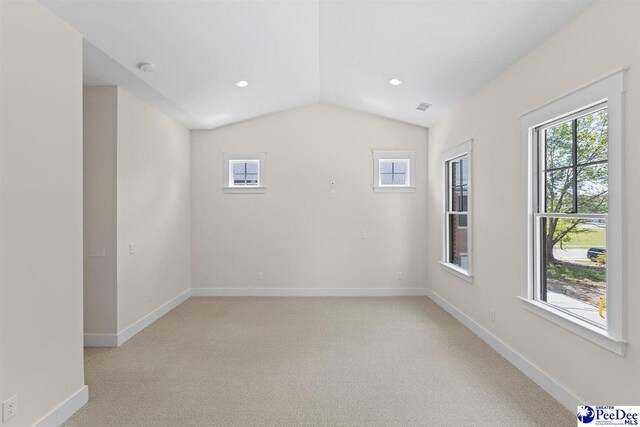 319 Railroad Ave, Florence, SC 29506 - unfurnished room featuring light colored carpet, baseboards, lofted ceiling, recessed lighting, and a smoke detector