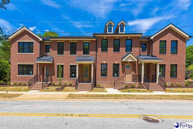 319 Railroad Ave, Florence, SC 29506 - townhome / multi-family property with brick siding