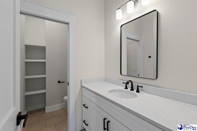 319 Railroad Ave, Florence, SC 29506 - bathroom with vanity and toilet