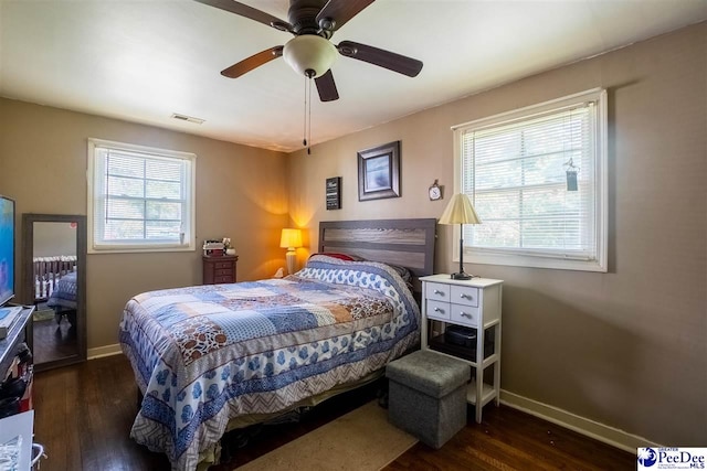 1510 N Rocky Way Dr, Florence, SC 29506 - bedroom with ceiling fan, baseboards, wood finished floors, and visible vents