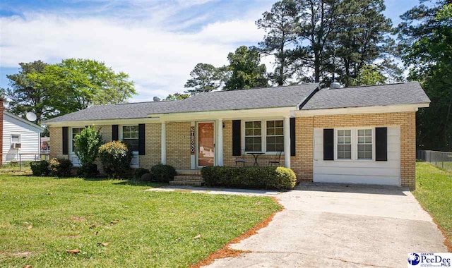 1510 N Rocky Way Dr, Florence, SC 29506 - ranch-style home with a front lawn and brick siding