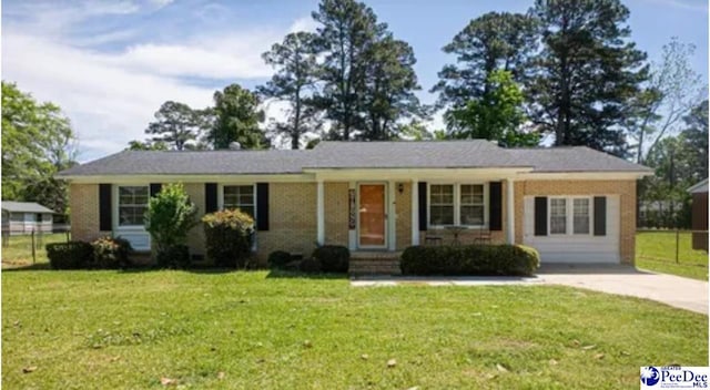 1510 N Rocky Way Dr, Florence, SC 29506 - ranch-style house with driveway, fence, and a front yard