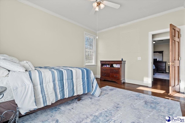 bedroom with ceiling fan, crown molding, baseboards, and wood finished floors