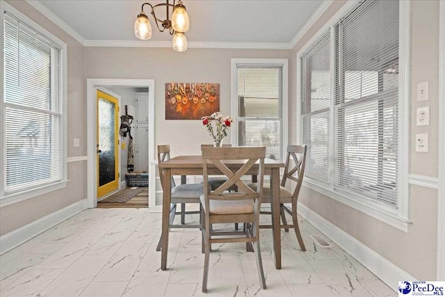 dining area with a wealth of natural light, baseboards, marble finish floor, and crown molding