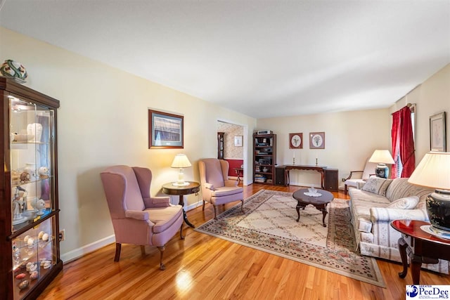908 Clarendon Ave, Florence, SC 29505 - living room with wood finished floors and baseboards