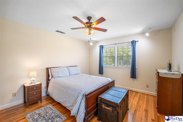 908 Clarendon Ave, Florence, SC 29505 - bedroom featuring light wood-style floors, baseboards, and ceiling fan