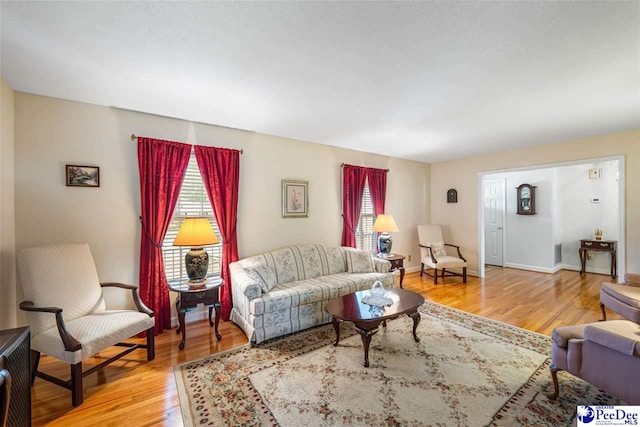 908 Clarendon Ave, Florence, SC 29505 - living area with wood finished floors and baseboards