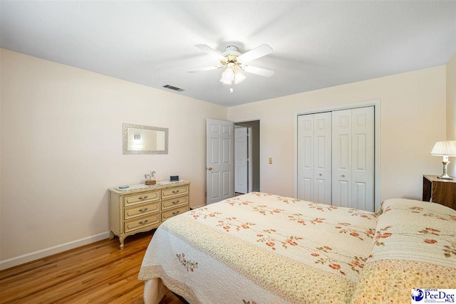 908 Clarendon Ave, Florence, SC 29505 - bedroom featuring light wood finished floors, baseboards, a closet, and ceiling fan