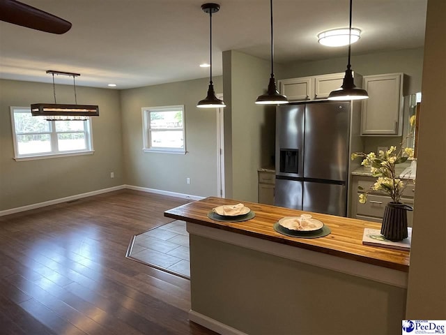 1429 E Home Ave, Hartsville, SC 29550 - kitchen featuring stainless steel fridge, wooden counters, baseboards, pendant lighting, and recessed lighting