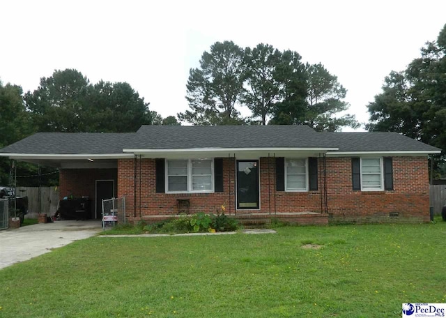 single story home featuring a front lawn and a carport