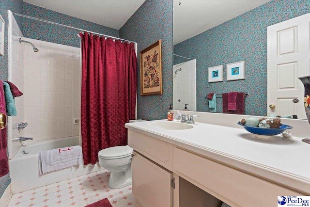 541 Fairway Dr, Florence, SC 29501 - bathroom with shower / bath combo, toilet, double vanity, wallpapered walls, and tile patterned floors