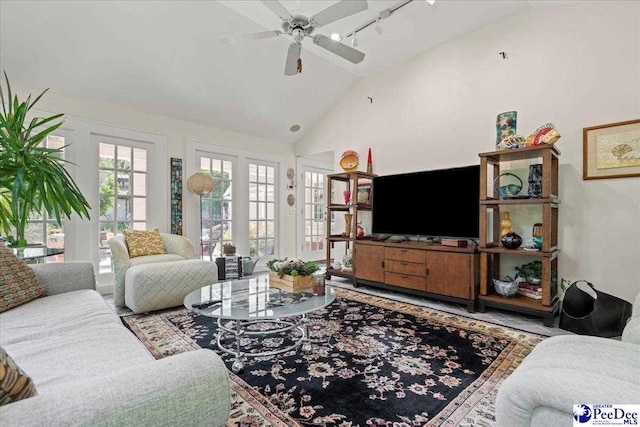541 Fairway Dr, Florence, SC 29501 - living area with vaulted ceiling, rail lighting, and a ceiling fan