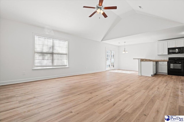 unfurnished living room with light wood-style floors, high vaulted ceiling, baseboards, and ceiling fan with notable chandelier