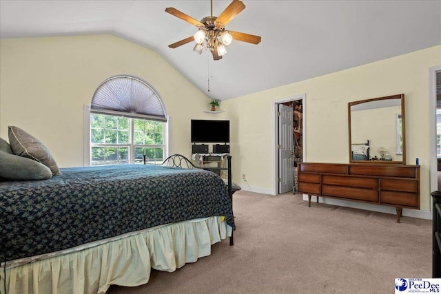 bedroom featuring high vaulted ceiling, ceiling fan, and carpet flooring
