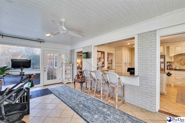 interior space featuring ceiling fan