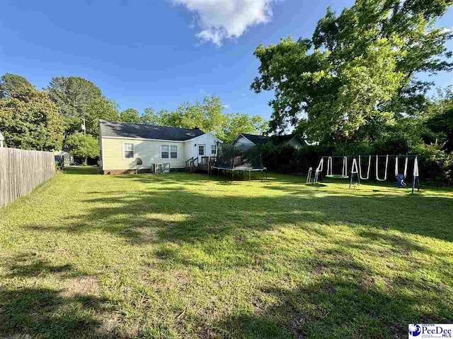 66 Victory Dr, Cheraw, SC 29520 - view of yard featuring a trampoline and a playground