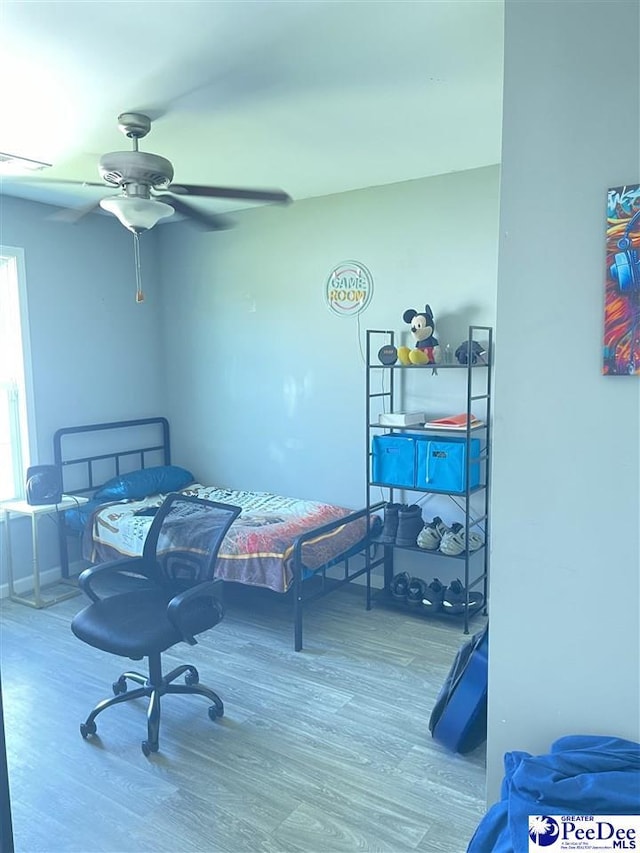3007 Colton Dr, Florence, SC 29506 - bedroom featuring a ceiling fan, wood finished floors, and visible vents