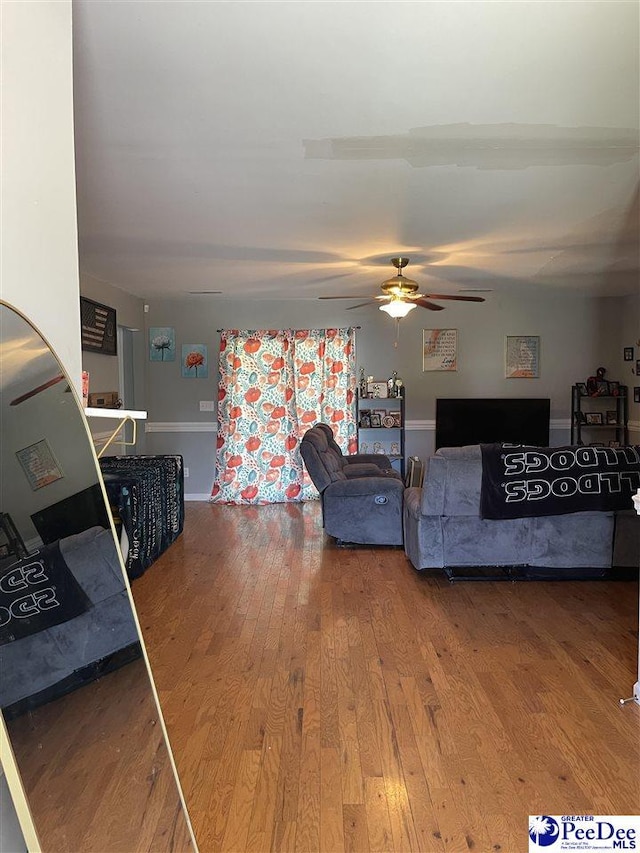 3007 Colton Dr, Florence, SC 29506 - living room with wood finished floors and ceiling fan