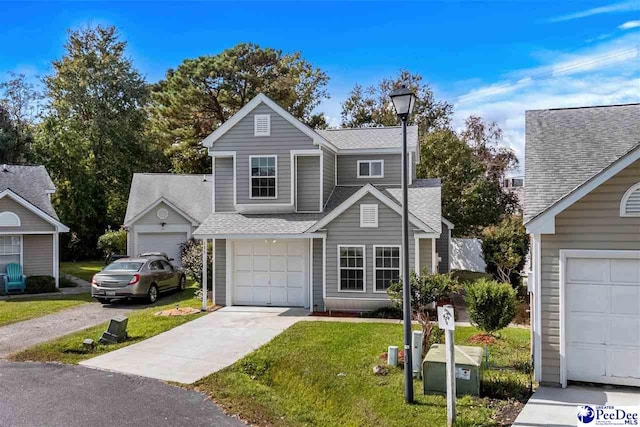 front of property with a garage and a front yard