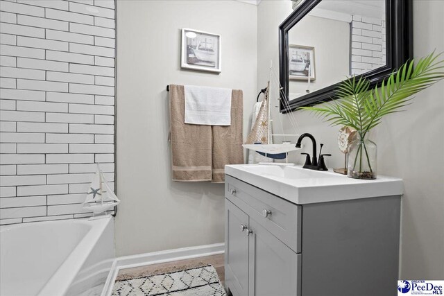 236 Wells St, Lake City, SC 29560 - full bathroom with vanity and baseboards