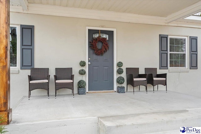 236 Wells St, Lake City, SC 29560 - view of exterior entry with stucco siding