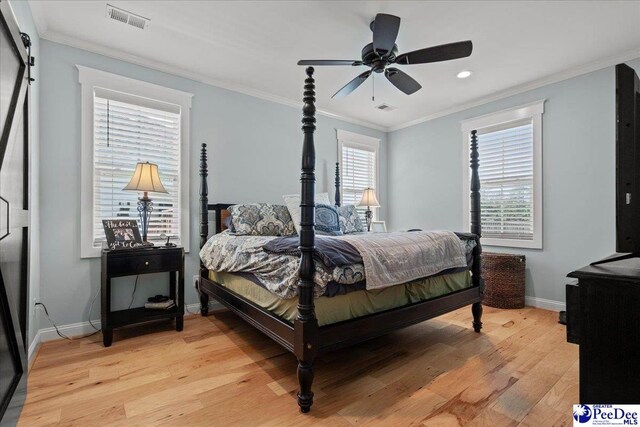 bedroom featuring light wood-type flooring, baseboards, ornamental molding, recessed lighting, and a ceiling fan