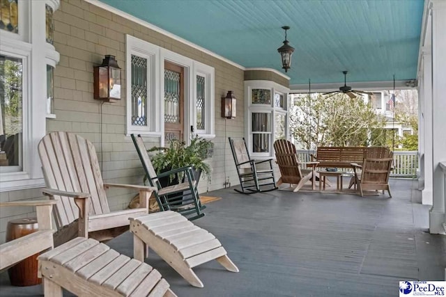 view of patio featuring a porch and ceiling fan