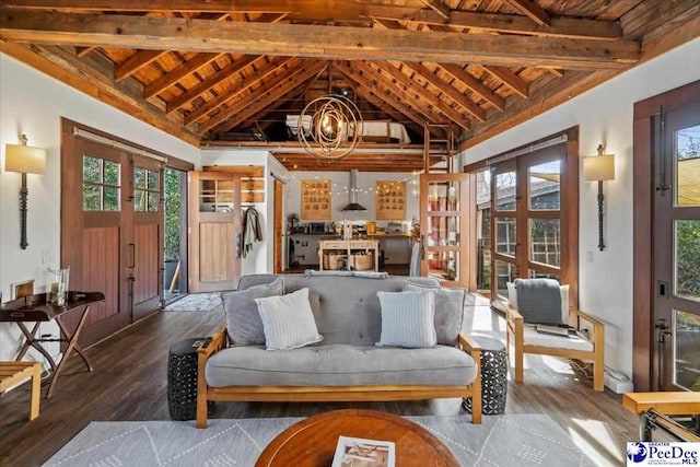 living room featuring french doors, vaulted ceiling with beams, wood ceiling, an inviting chandelier, and hardwood / wood-style floors