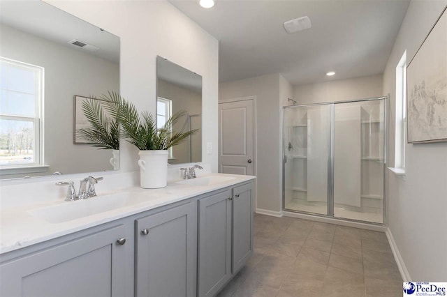 555 Strawberry Field Way, Galivants Ferry, SC 29588 - bathroom featuring a stall shower, double vanity, recessed lighting, tile patterned floors, and baseboards