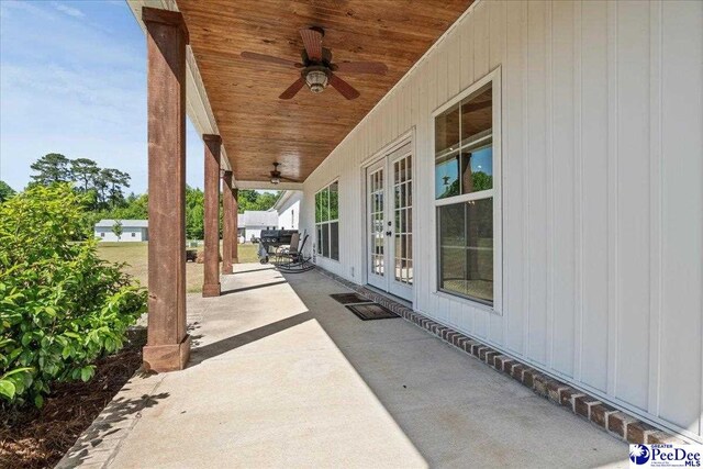 view of patio with ceiling fan and french doors