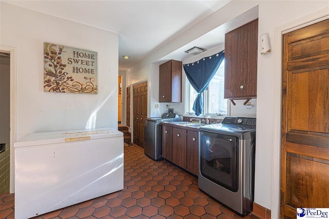 634 Georgetown Rd, Darlington, SC 29532 - kitchen with fridge, sink, and washing machine and clothes dryer