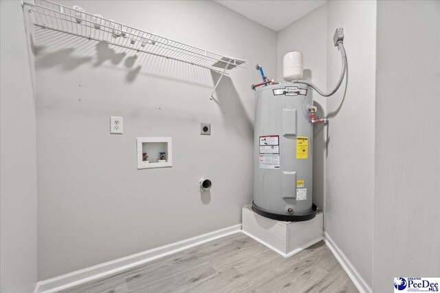 2125-D Sanderling Dr, Florence, SC 29505 - laundry area with laundry area, light wood-type flooring, electric water heater, electric dryer hookup, and washer hookup