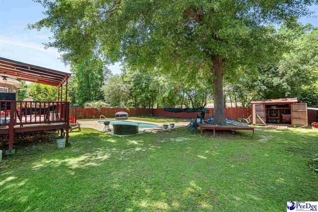 953 Rice Planters Ln, Florence, SC 29501 - view of yard featuring a wooden deck